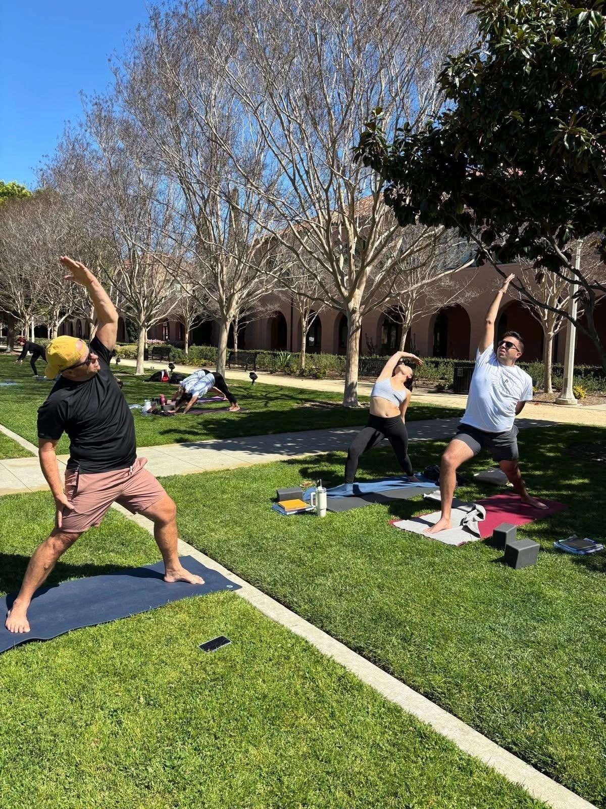 Group yoga class outdoors